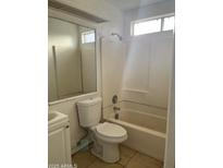 Clean bathroom with a bathtub, toilet, and vanity at 1508 E Todd E Dr, Tempe, AZ 85283