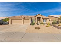 Beautiful desert landscape surrounds this single-story home with a three-car garage at 4966 E Juana Ct, Cave Creek, AZ 85331