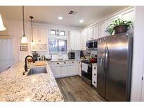 Spacious kitchen with granite countertops and stainless steel appliances at 11500 E Cochise Dr # 2070, Scottsdale, AZ 85259