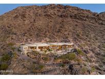 Luxury home nestled on mountainside with stunning views and a private driveway at 5526 E Roadrunner Rd, Paradise Valley, AZ 85253