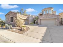 Elegant two-story home with stone accents and a two-car garage at 7445 E Eagle Crest Dr # 1081, Mesa, AZ 85207