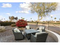 Patio with fire pit and comfortable seating area at 3171 N 159Th Ave, Goodyear, AZ 85395