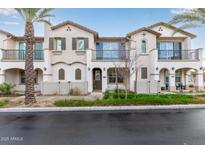 Two-story townhome with modern facade and landscaped grounds at 4707 S Vapor Dr, Mesa, AZ 85212