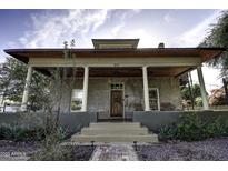 Charming craftsman home with a large front porch and well-manicured landscaping at 531 E Lynwood St, Phoenix, AZ 85004