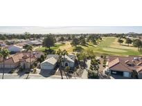 Aerial view of single-story home with golf course views at 563 W Champagne Dr, Chandler, AZ 85248