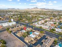 Aerial view showing complex, pool, and surrounding area at 5330 N Central Ave # 3, Phoenix, AZ 85012