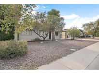 Ranch style home with a landscaped front yard and driveway at 6725 E Moreland St, Scottsdale, AZ 85257