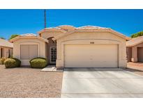 One-story house with a two-car garage and desert landscaping at 1762 S Saddle St, Gilbert, AZ 85233
