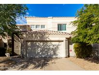 Two-story home with attached garage and desert landscaping at 16450 E Ave Of The Fountains -- # 23, Fountain Hills, AZ 85268