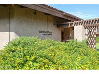 Winfield Place condo building exterior with landscaping at 7436 E Chaparral Rd # B260, Scottsdale, AZ 85250