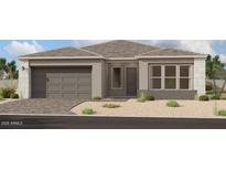 One-story home with a two-car garage and neutral color palette at 11441 E Utah Ave, Mesa, AZ 85212