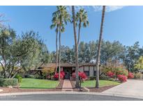 Beautiful home exterior with landscaping and a walkway at 17045 N 58Th Way, Scottsdale, AZ 85254