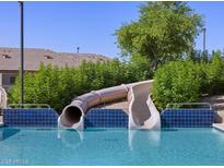 Community pool with waterslide and multiple decks at 335 S San Fernando Ln, Casa Grande, AZ 85194