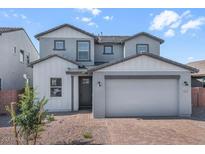 Charming two-story home featuring a two-car garage and appealing curb appeal at 4120 E Ghost Flower Ln, San Tan Valley, AZ 85140