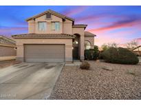 Charming two-story home with a large garage and desert landscaping at 934 S Bristol Dr, Mesa, AZ 85208