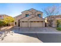 Charming two-story home featuring a three car garage, neutral color palette, and well-manicured landscaping at 4629 E Tumbleweed Dr, Cave Creek, AZ 85331