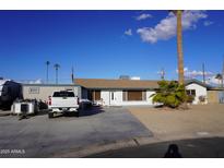 Single-story home with driveway, landscaping, and a spacious yard at 8643 S 16Th Pl, Phoenix, AZ 85042