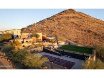 Luxury estate with tennis court, pool, and mountain views at 5113 W Arrowhead Lakes Dr, Glendale, AZ 85308