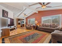 Spacious living room featuring a wood-burning stove and comfortable seating at 5402 E Mckellips Rd # 276, Mesa, AZ 85215