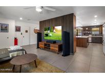 Open living area with modern furnishings and a view of the kitchen at 5820 N 83Rd St, Scottsdale, AZ 85250