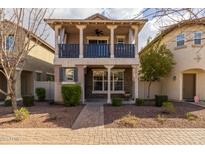 Two-story home with balcony and front yard landscaping at 1094 S Agnes Ln, Gilbert, AZ 85296