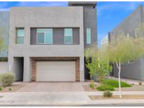 Modern two-story home with attached garage and landscaped front yard at 25330 N 19Th Dr, Phoenix, AZ 85085