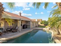 Inviting backyard with a sparkling pool and patio seating at 500 E Encinas Ave, Gilbert, AZ 85234