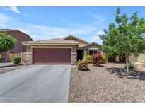 Single-story home with attached garage and landscaped front yard at 2218 E Gillcrest Rd, Gilbert, AZ 85298