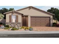 One-story home with brown garage door and stone accents at 8660 W Warner St, Tolleson, AZ 85353