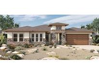 One-story home with stone accents and a two-car garage at 12331 W Parkway Ln, Avondale, AZ 85323