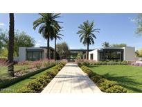 Modern home with palm trees and landscaped walkway at 6126 E Maverick Rd, Paradise Valley, AZ 85253