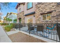 Cozy patio with seating area, perfect for outdoor enjoyment at 1918 E Bridgeport Pkwy # 102, Gilbert, AZ 85295