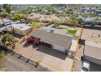 Single-story home featuring a spacious backyard with desert landscaping and a long driveway at 134 N 87Th St, Mesa, AZ 85207