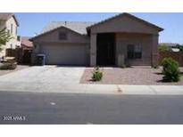 One-story house with attached garage and small front yard at 14970 W Riviera Dr, Surprise, AZ 85379