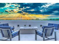 Relaxing fire pit area with comfortable seating and sunset view at 6803 E Main St # 1110, Scottsdale, AZ 85251