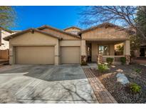 Two-story house with two-car garage and landscaped front yard at 12759 W Eagle Ridge Ln, Peoria, AZ 85383