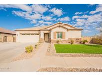 One-story home with attached garage and landscaped front yard at 22282 E Tierra Grande Ct, Queen Creek, AZ 85142