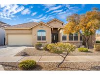 One-story home with desert landscaping and a two-car garage at 33612 N 24Th Dr, Phoenix, AZ 85085