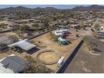 Aerial view showing house, RV, and horse arena at 35849 N 3Rd St, Phoenix, AZ 85086