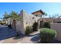 Spanish style home with gated entry and attached garage at 3013 W Phelps Rd, Phoenix, AZ 85053