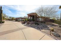 Stunning single story home with landscaped desert and a private entry gate at 9015 E Hackamore Dr, Scottsdale, AZ 85255