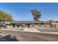 Updated single story home with modern exterior and landscaping at 1232 E Kaler Dr, Phoenix, AZ 85020