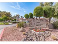 Desert Foothills Villas Condominium entrance sign and landscaping at 10610 S 48Th St # 2096, Phoenix, AZ 85044