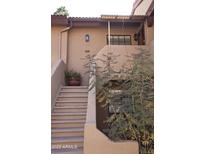 Attractive exterior of a condo building with stairs and landscaping at 1351 N Pleasant Dr # 2172, Chandler, AZ 85225