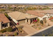 Aerial view of single-story home with desert landscaping and mountain views at 17848 E Stocking Trl, Rio Verde, AZ 85263