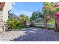 Landscaped backyard with a patio and putting green at 4700 S Fulton Ranch Blvd # 62, Chandler, AZ 85248