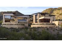 Stunning contemporary home nestled in the mountains with a multi-level design and infinity pool at 7256 N 40Th St # 6, Paradise Valley, AZ 85253