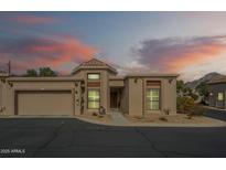 Charming home featuring a two-car garage, desert landscaping, and covered entryway at 6366 N 19Th St, Phoenix, AZ 85016