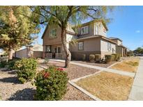 Two-story house with landscaping and a walkway at 2212 E Sunland Ave, Phoenix, AZ 85040