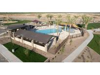 Resort-style pool with a covered patio and playground at 4761 E Topaz Dr, San Tan Valley, AZ 85140